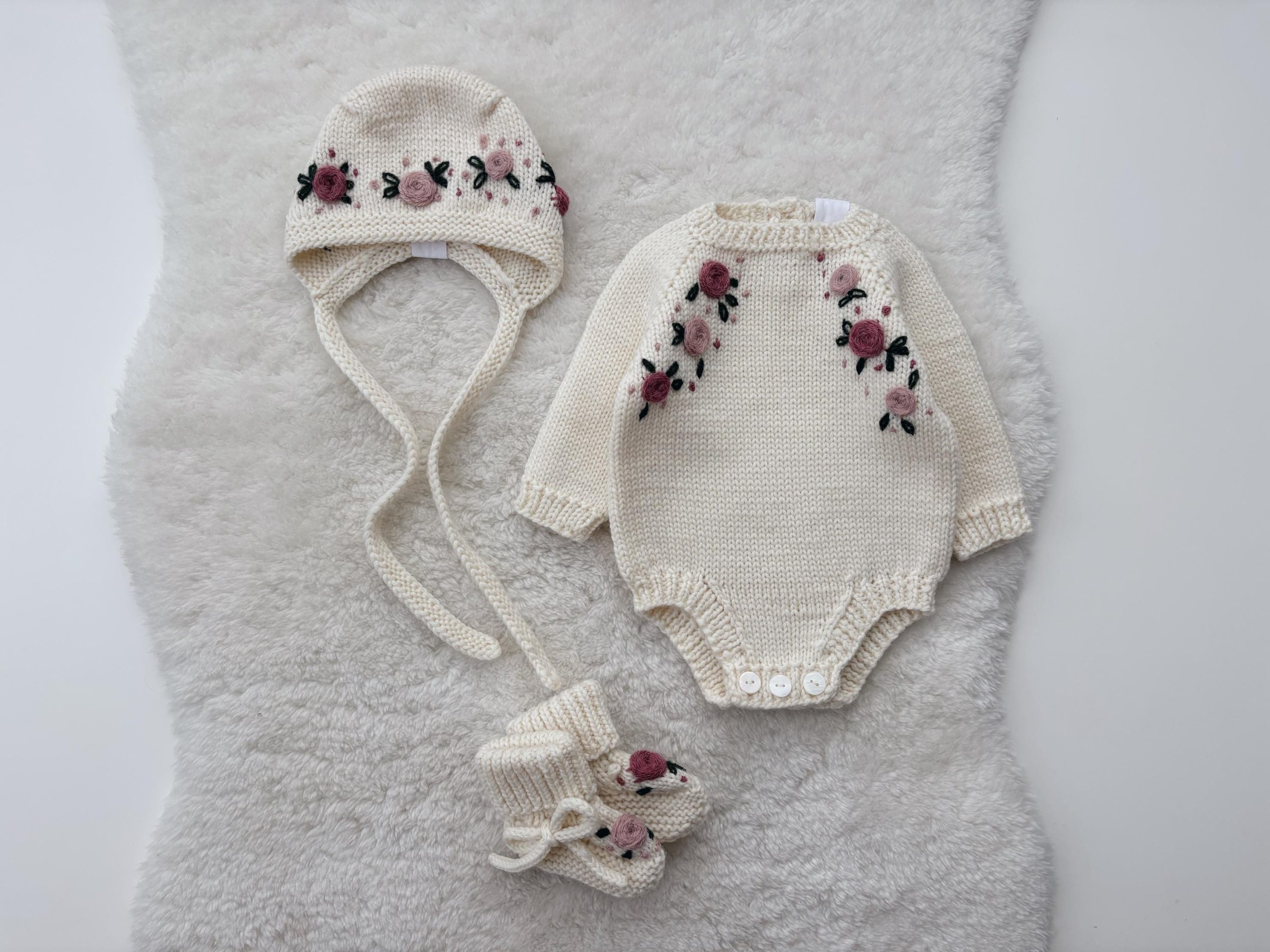il_fullxfull.6699930473_ahi6 Merino Knit Baby Romper Set, Floral Bonnet & Booties - Image 1